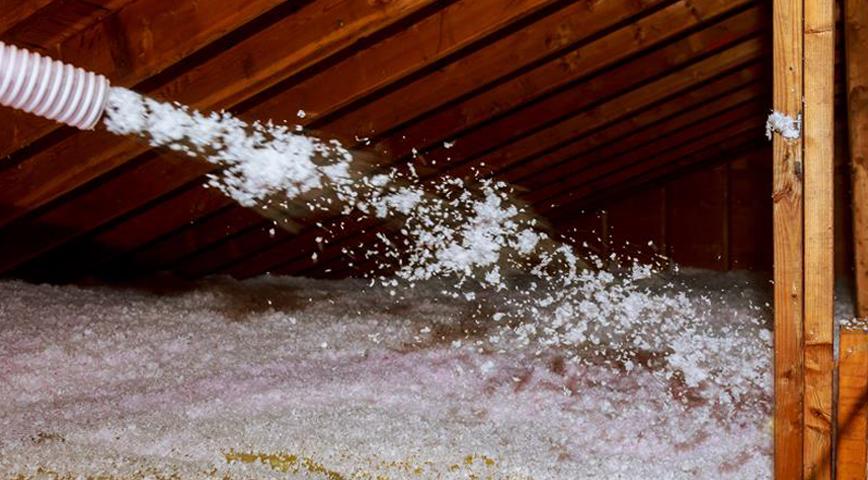 A photo of adding insulation to the attic
