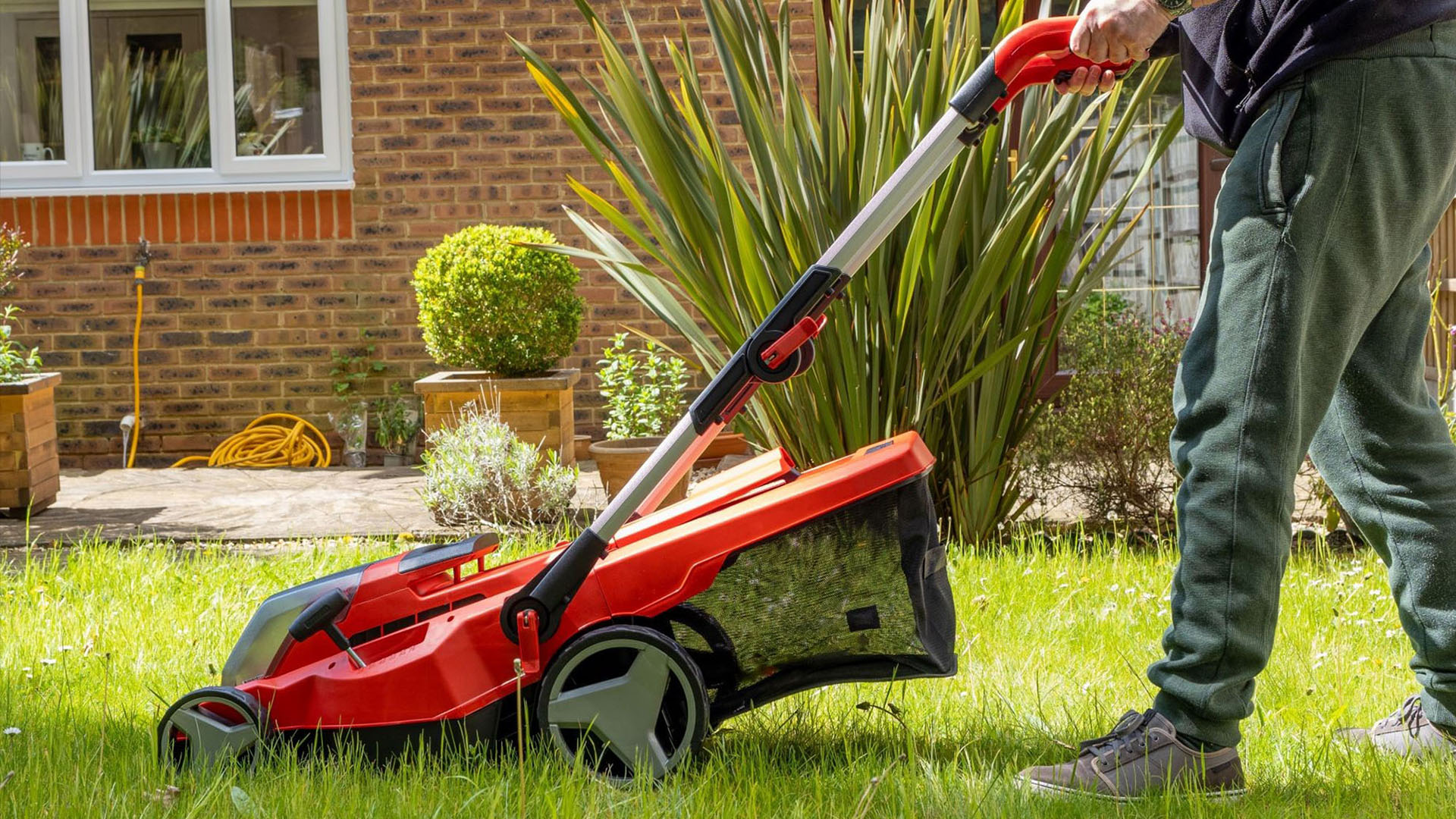 A photo of electric powered lawnmower